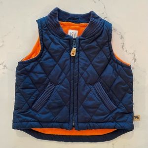 Baby Gap quilted puffer vest, navy exterior, orange fleece interior, siz…